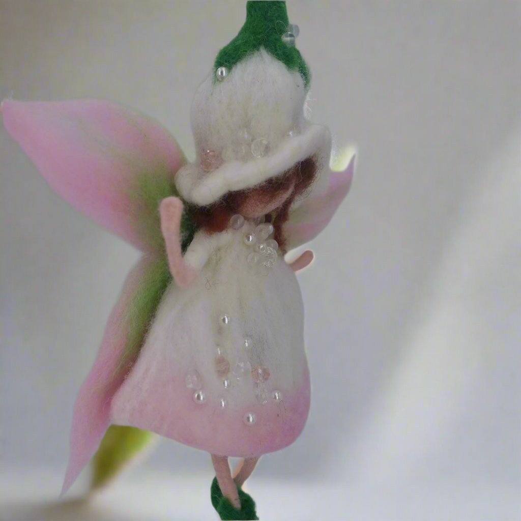 Waldorf-inspired Olivia felt angel tree topper by Maria Callary Toys, handcrafted from wool for a magical holiday touch.