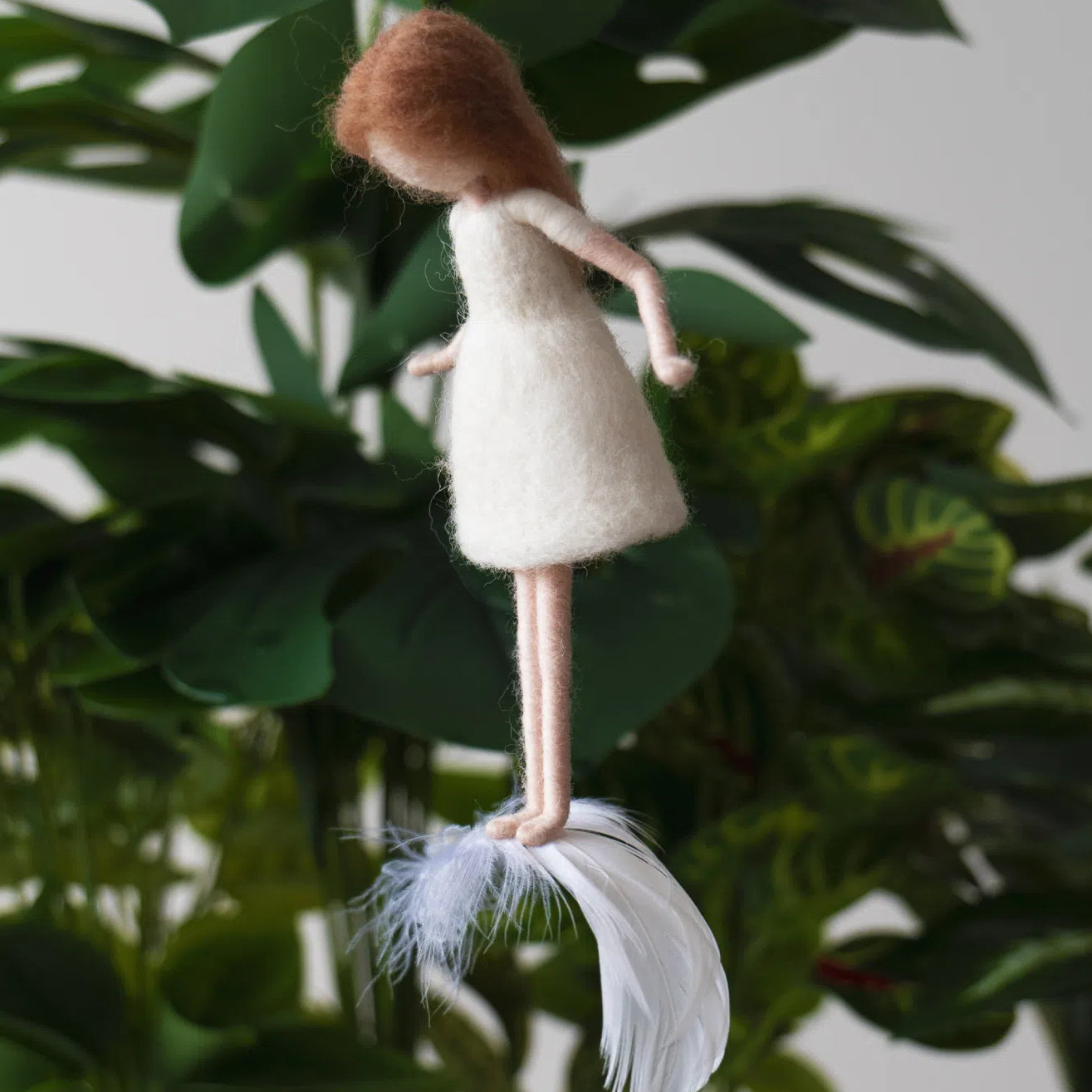 Celest, a needle felted fairy by Maria Callary Toys, featured as a felt Christmas tree ornament for holiday decor.