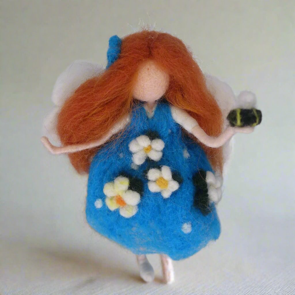 Handmade Emily needle felted fairy tree topper, wool angel for Christmas tree decorations by Maria Callary Toys.