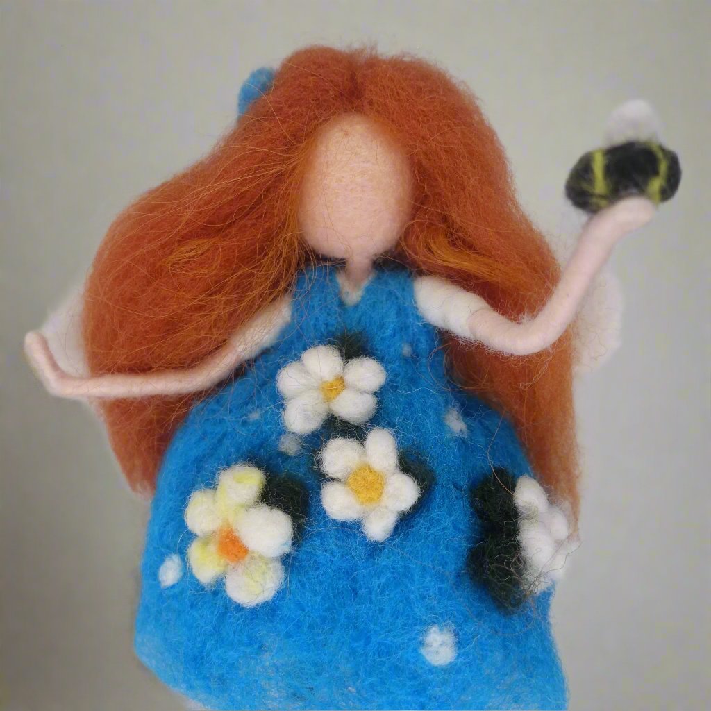 Emily wool angel tree topper, Waldorf inspired felt angel ornament for holiday decor by Maria Callary Toys.