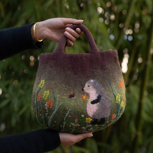 Hedgehog Haven with Floral Delights Bag - Enchanted Hedgehog Gathering Flowers Amidst Blooming Flora