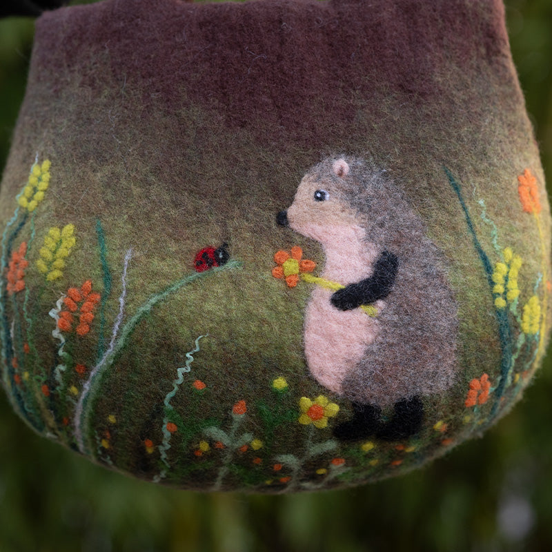 Hedgehog Haven with Floral Delights Bag - Enchanted Hedgehog Gathering Flowers Amidst Blooming Flora