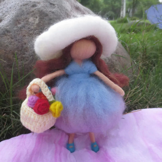 Olivia, a handcrafted needle felted fairy doll, Waldorf-inspired design, perfect for holiday decor or nursery fairy themes.