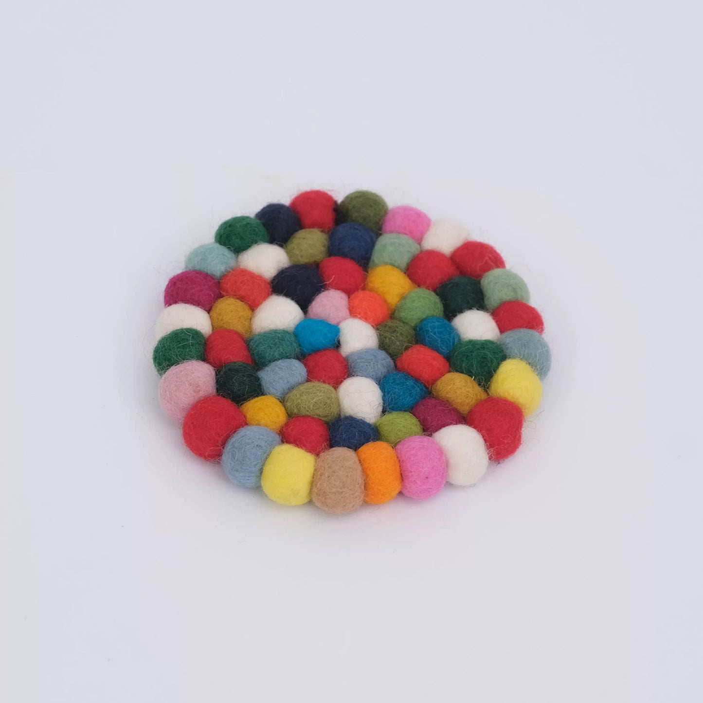 Vibrant Round Felt Ball Coasters for Your Table by Maria Callary Toys