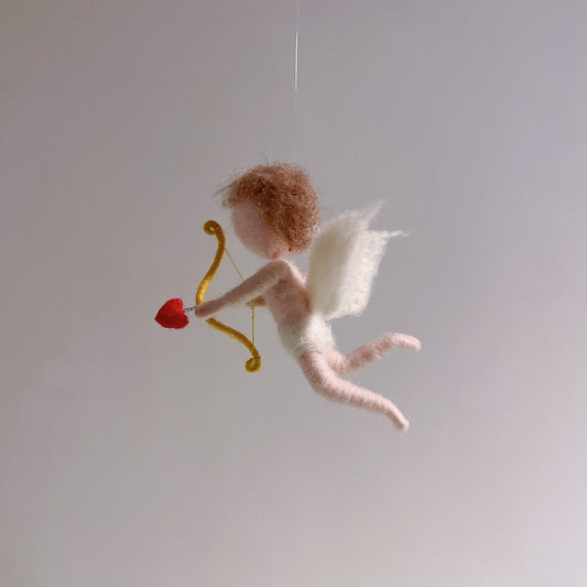 Cupid Fairy from Maria Callary Toys, a handcrafted needle felted fairy perfect for home decor and nursery ideas.